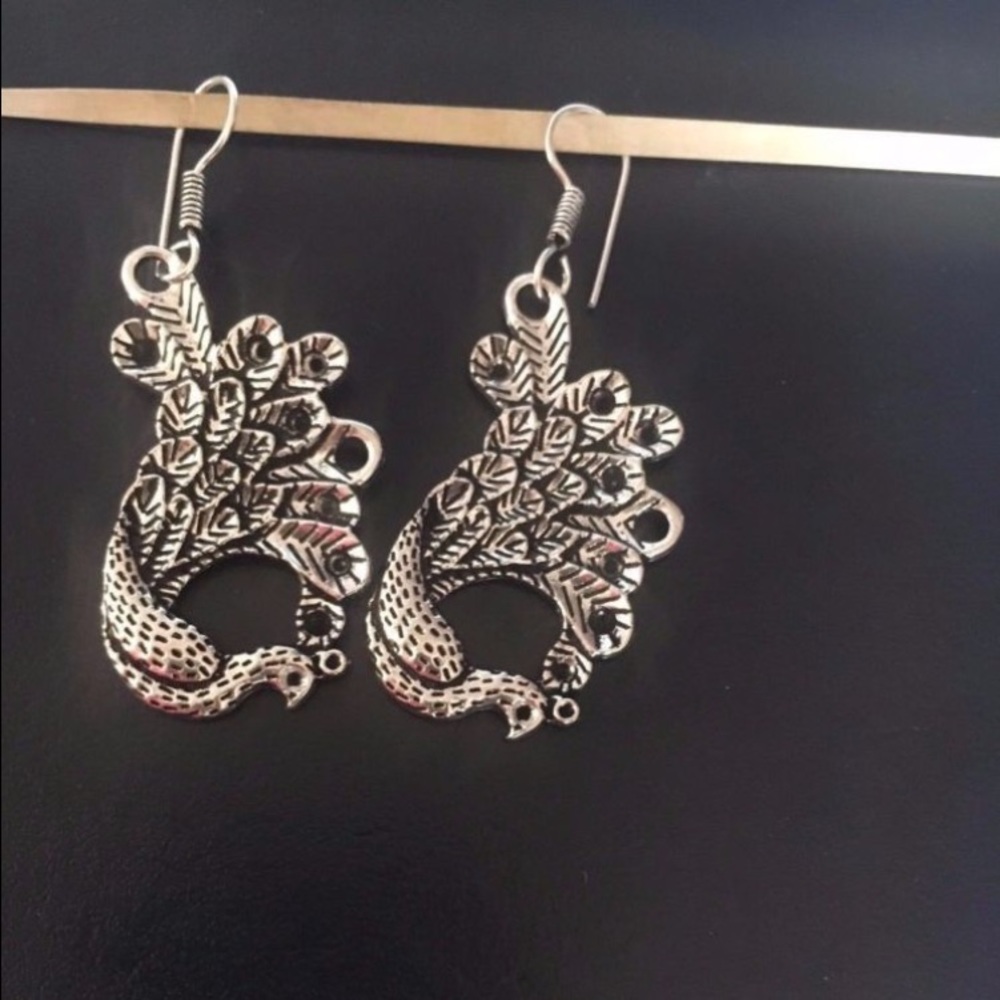 Peacock design earrings metal carved earrings