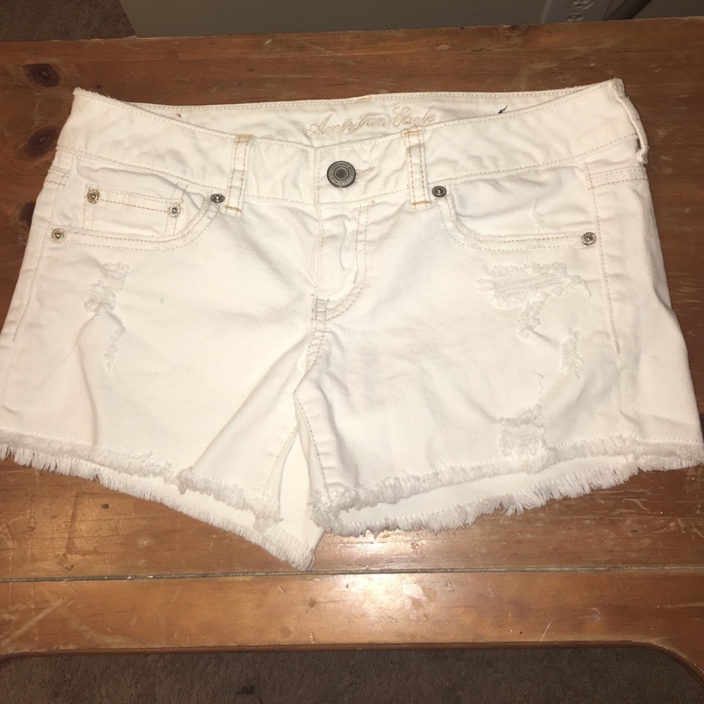 White, distressed, midi American Eagle shorts