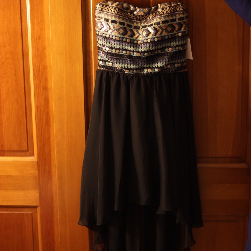 Strapless, high-low dress. Never worn, small.