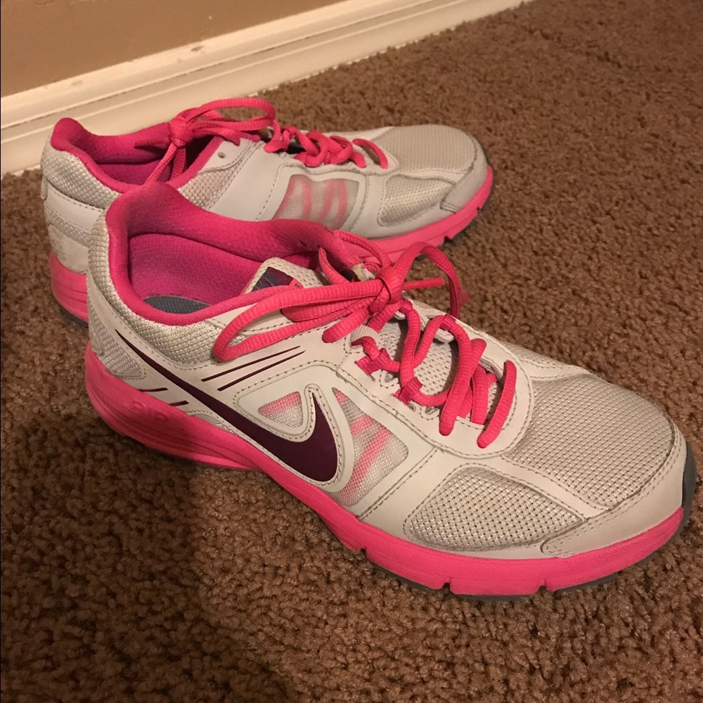 Pink and grey nikes.