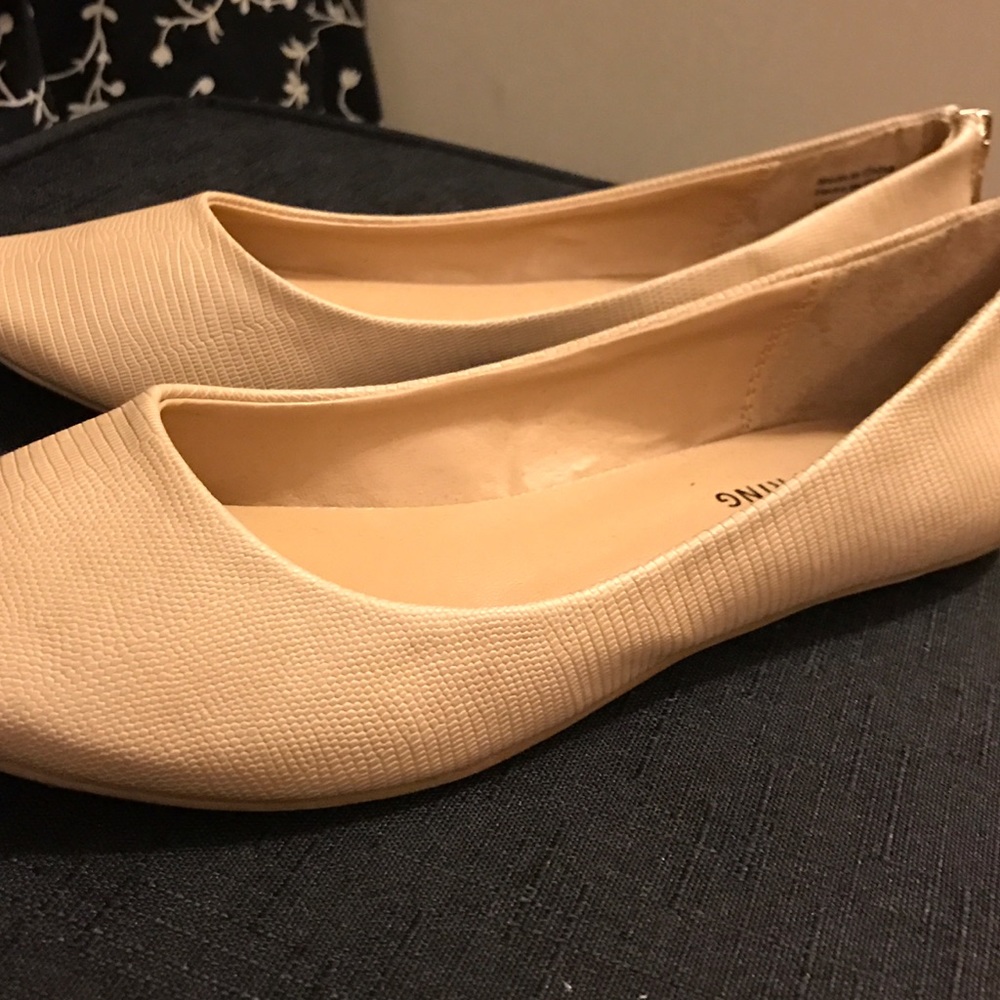 Call it spring nude flats with gold zipper
