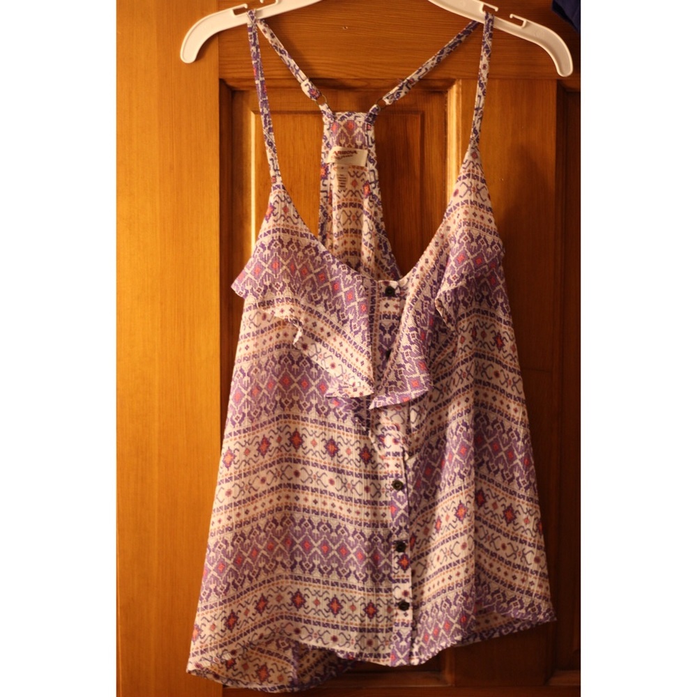 Cute racerback tank! In like new condition.