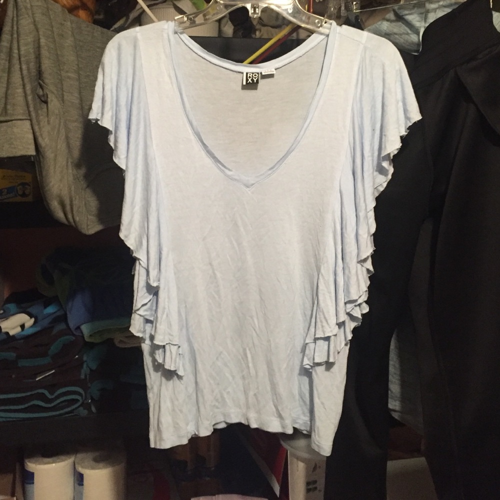 baby blue ruffle sided shirt