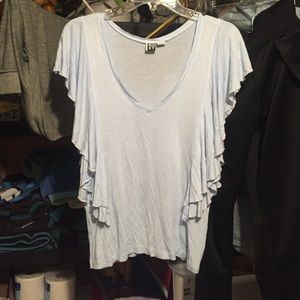 baby blue ruffle sided shirt