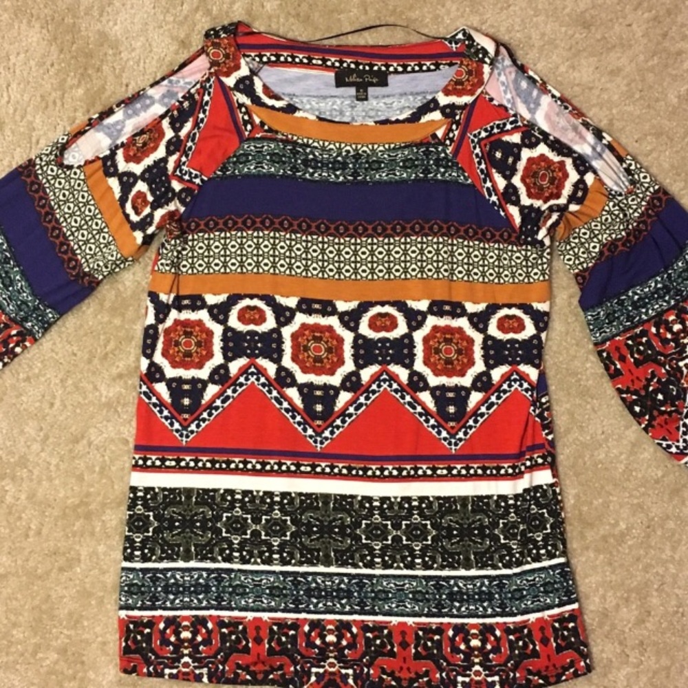 Colourful open shoulder top.