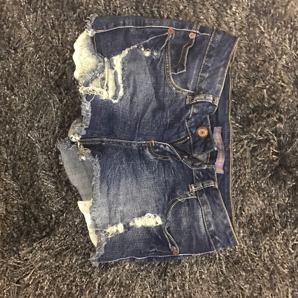 Shredded jean shorts