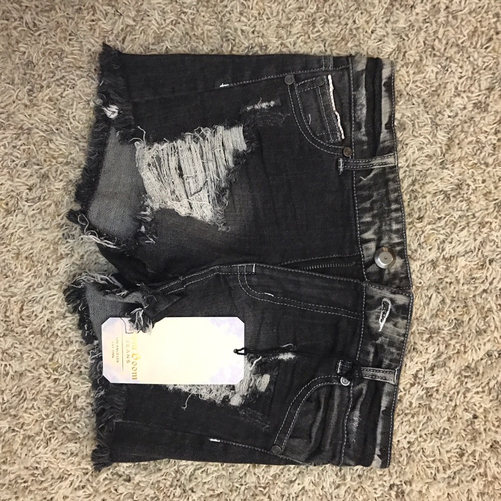 Never worn black shredded jean shorts