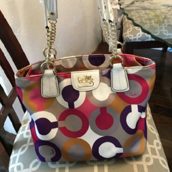 coach purse cheaper at M ri
