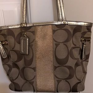 Brown and gold Coach purse