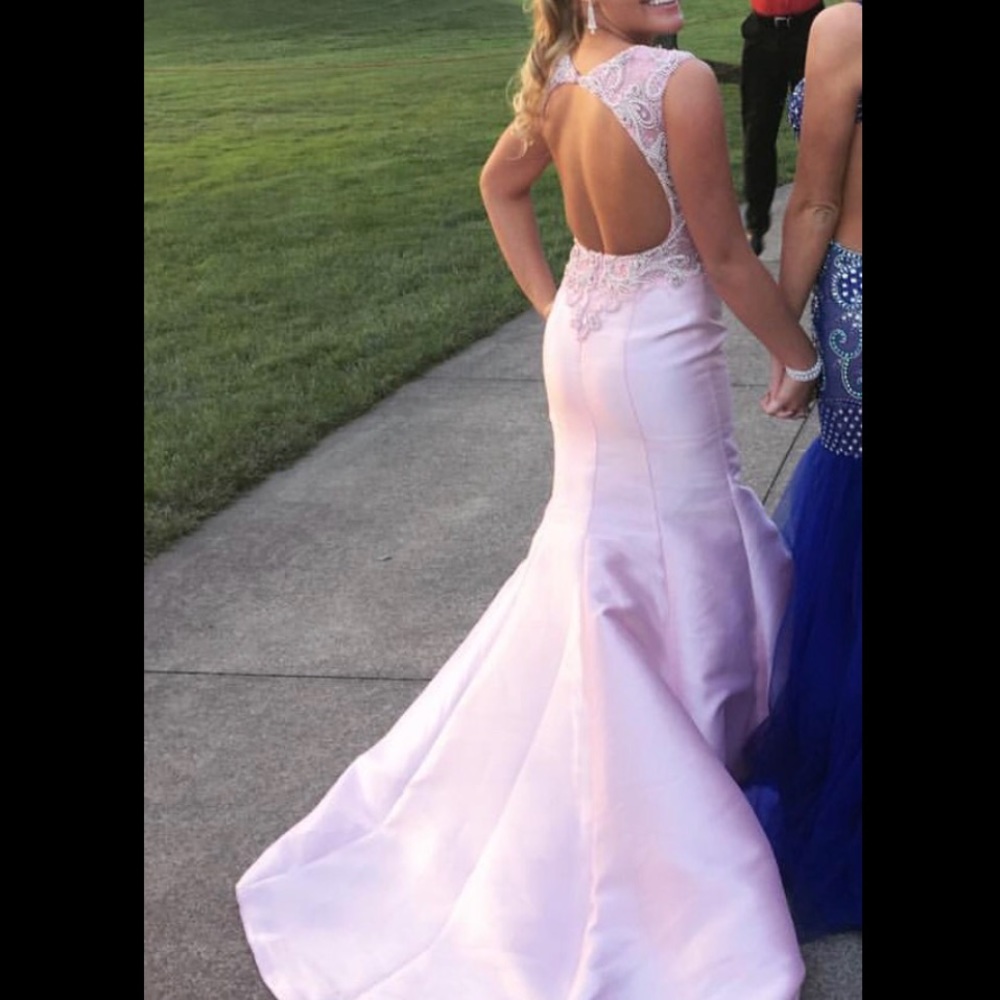 Very detailed pearl pink prom dress.