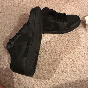All black Jordan Ones