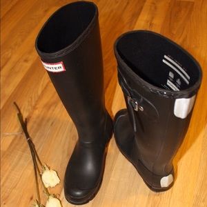 Hunter rain boots.