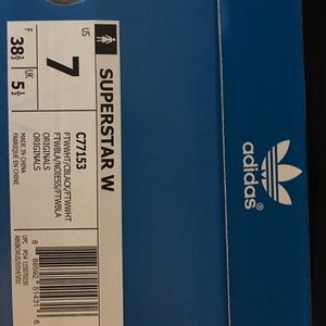 White and black adidas ! (Superstar)