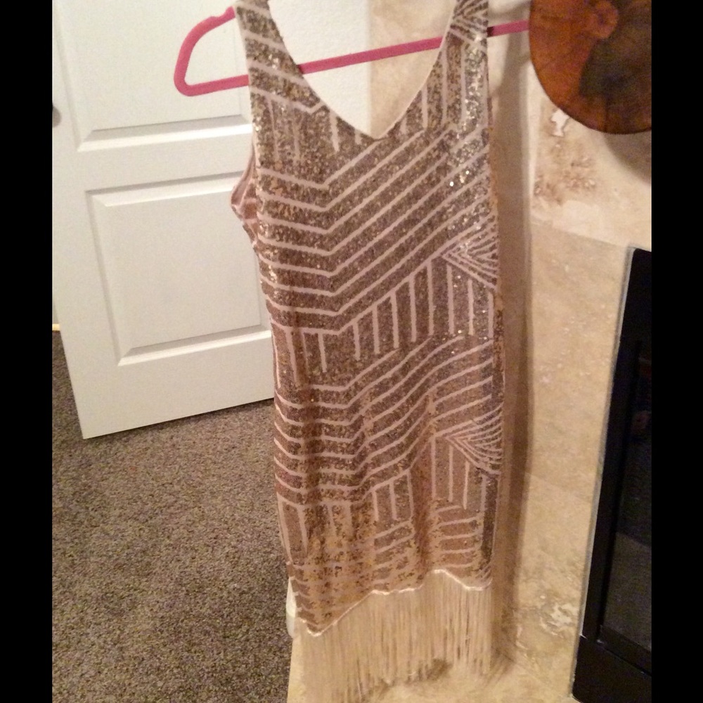 Gold sequin dress.