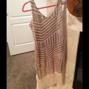 Gold sequin dress.