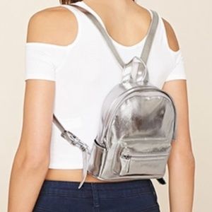Mini silver faux leather backpack