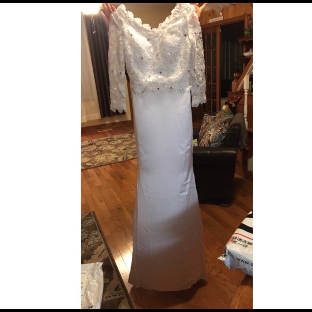 wedding dress never worn couldn't return