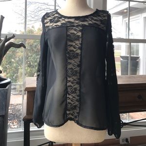 Sheer black blouse