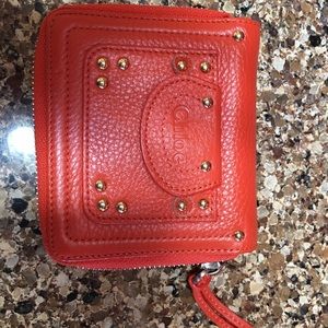 Gorgeous Chloe vibrant orange wallet made in Italy