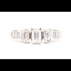 White gold and emerald cut diamond ring