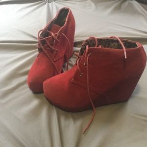 Red wedge booties