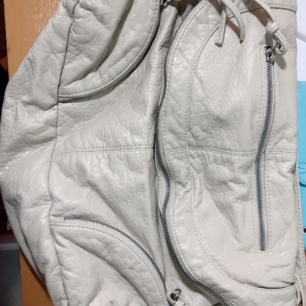 Beige pocketed long strap bag