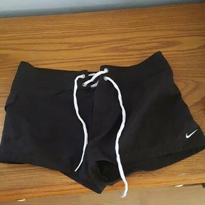 Nike board shorts.