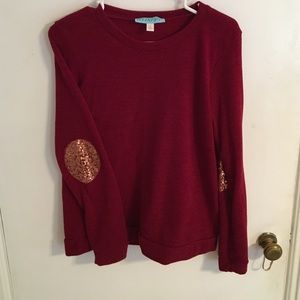 Burgundy sweater with gold sequin elbow pads