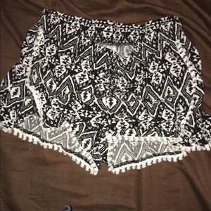 Black and white shorts.