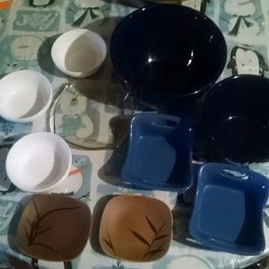 Mixed set of ceramic, glass and stoneware bowls.