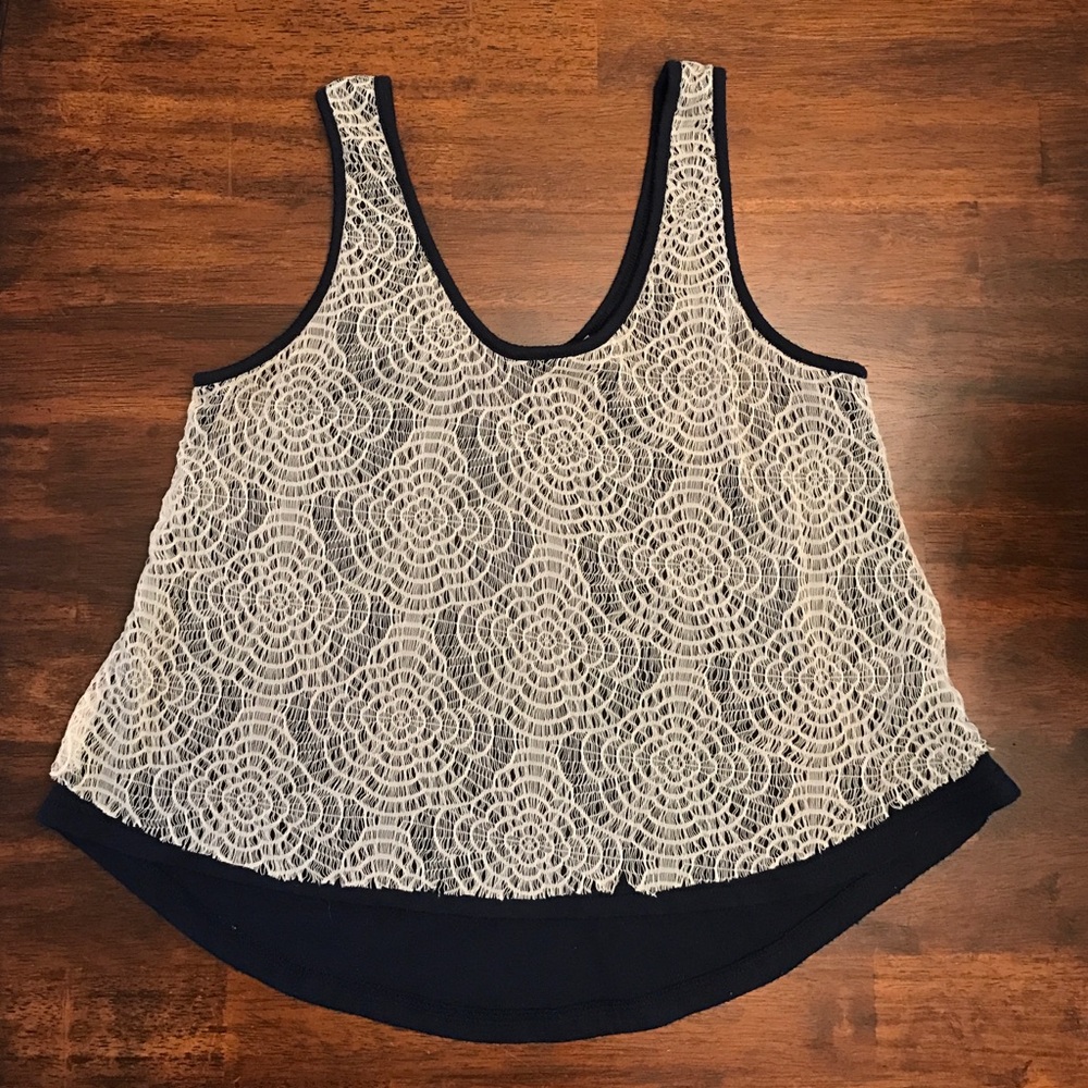 Zinga cream lace top with navy underlay