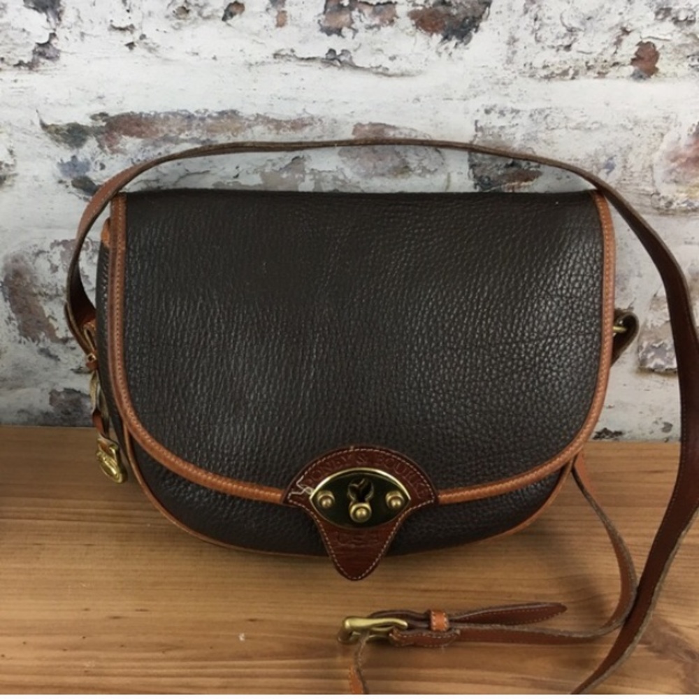 SOLD Dooney and Bourke large saddle bag 10"w 9" h