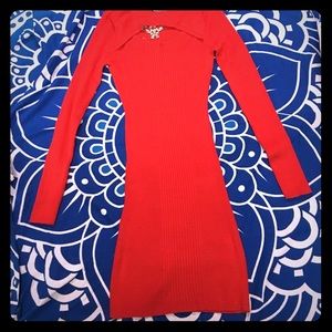 Peek a boo cut away bodycon sweater dress.