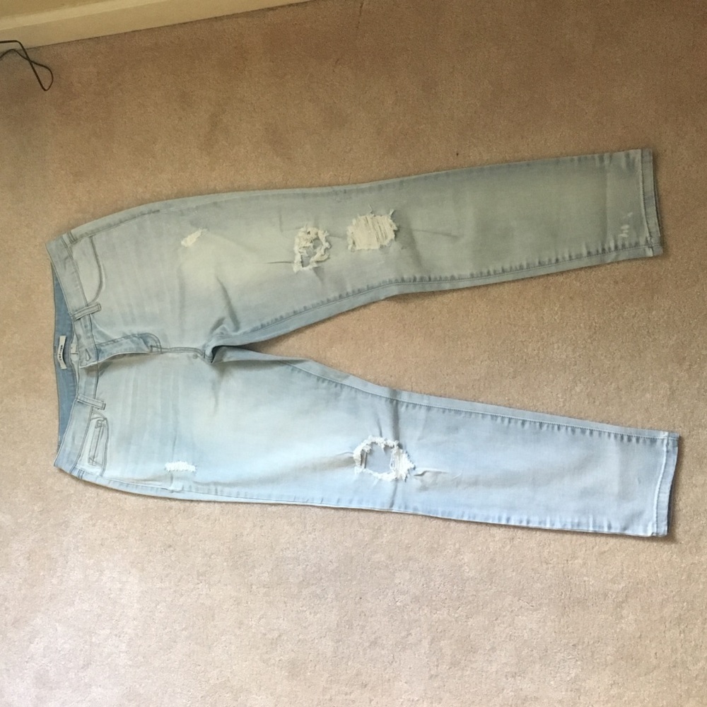 Light blue ripped jeans