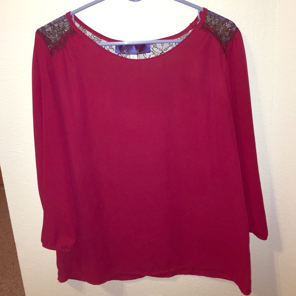 Red top, black lace back