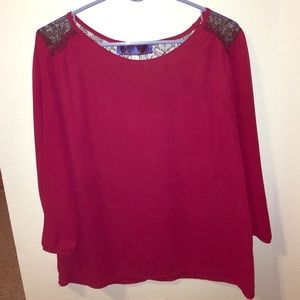 Red top, black lace back