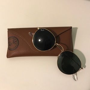 Raybans gold rims with black tint sunglasses