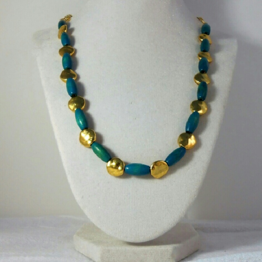 Turquoise wood beads, gold spacers, and link chain