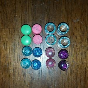 8 pair of Size 00 gauge plugs Reserved