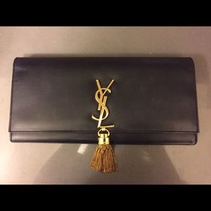 Saint Laurent black and gold tassel clutch