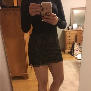 Black and gold lace mini skirt