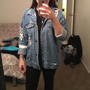 Distressed denim jacket