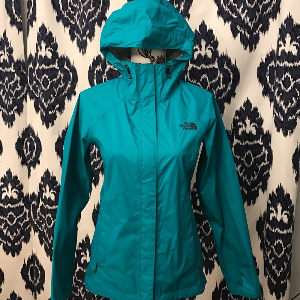 Teal North Face rain jacket