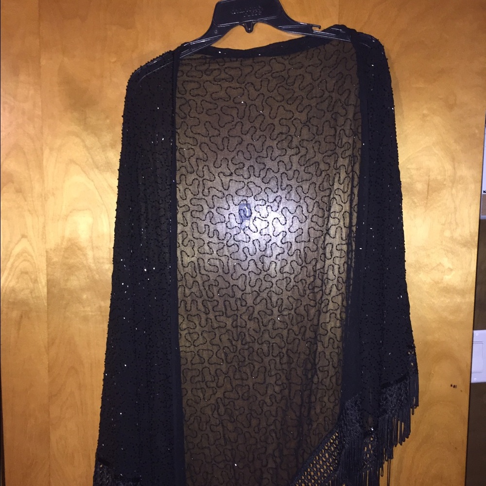 Fringed wrap with beading