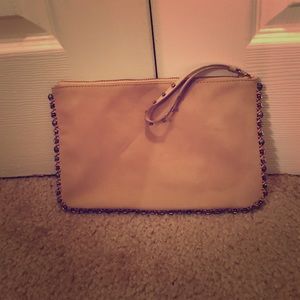 Tan wristlet with embellished trim