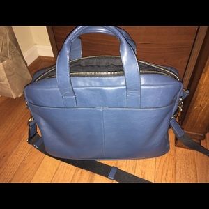 Coach tote/briefcase. Could fit a laptop.