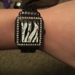 Black watch with zebra print face