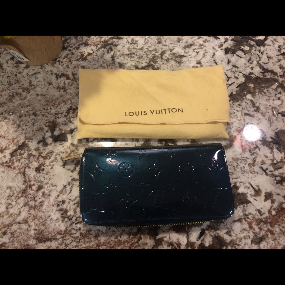 Louis Vuitton Authentic dark green zipper wallet