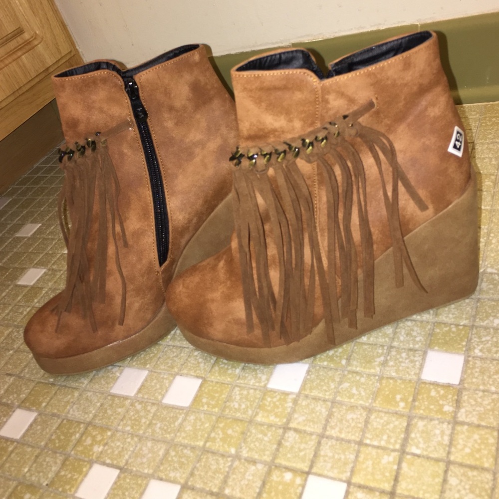 NEVER WORN Fringe Booties.