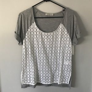 Grey Anthropologie tee with modern eyelet